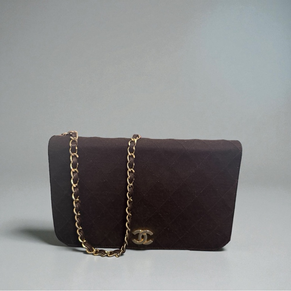 CHANEL Dark Brown Quilted Clutch with Gold Chain